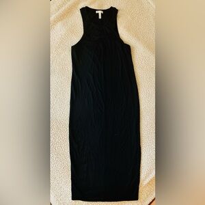 A black mid length form fitting dress no side slits worn once practically new